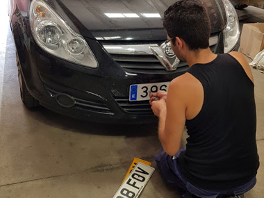 New Spanish registration plates being fitted to Vauxhall Corsa Vauxhall Corsa changing reg plates